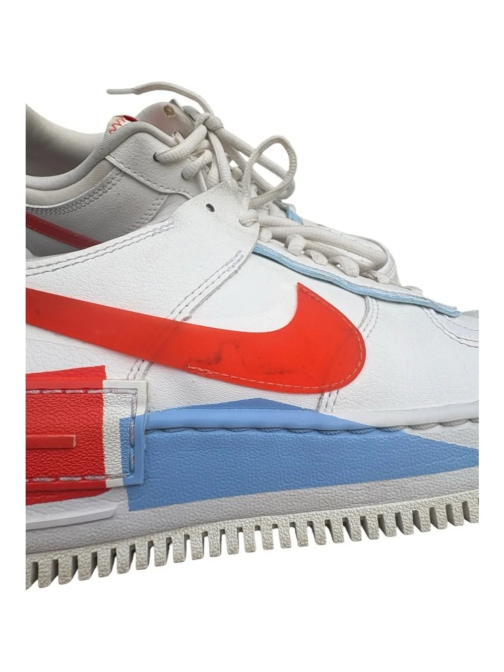 Nike Women’s White Sneakers with Orange Swoosh and Light Blue Accents